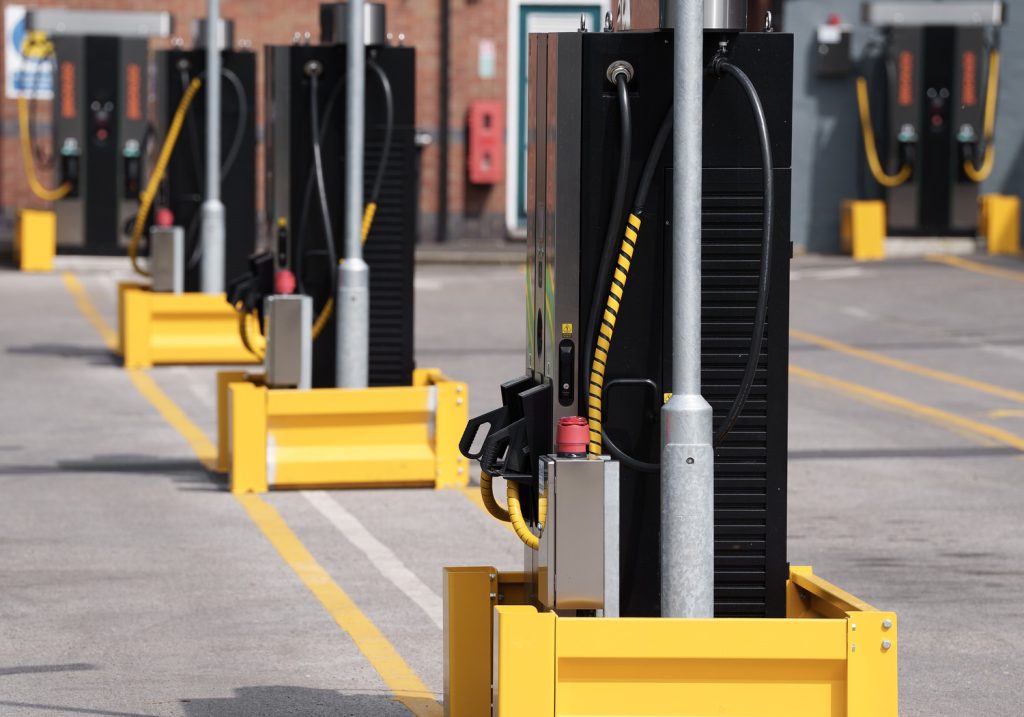 Zenobē chargers lined up at a bus depot in the UK